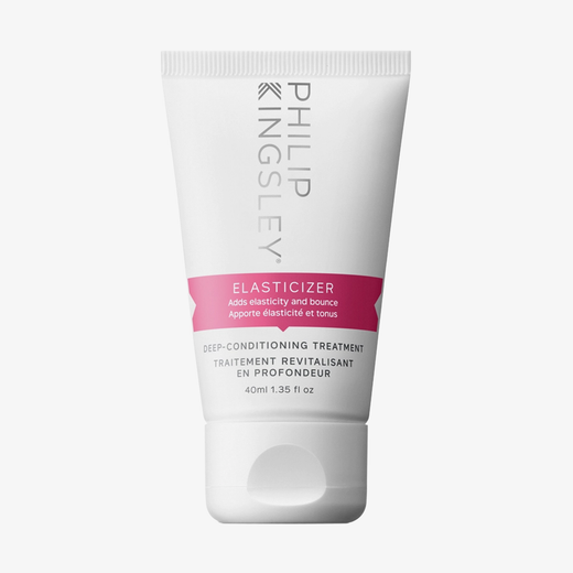 Philip Kingsley Elasticizer 40 ml: Intensivpflege in einer weißen Tube mit rosa Etikett, schwarzer und grauer Schrift auf weißem Hintergrund.