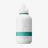 Eine weiße Flasche „Philip Kingsley Moisture Balancing Shampoo“ mit einem türkisfarbenen Etikett und einem Klappverschluss.