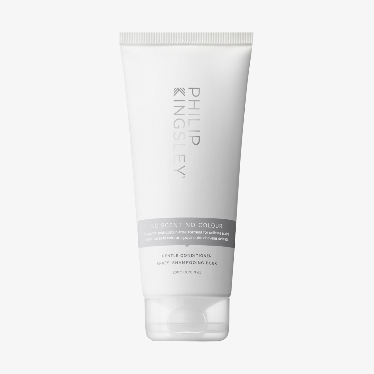 Eine weiße 200-ml-Tube des „No Scent No Colour“-Conditioners von Philip Kingsley steht aufrecht auf einem weißen Hintergrund.