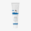 Weiße Tube Birch Juice Moisturizing Sunscreen mit Grafik einer Frau neben Birken vor weißem Hintergrund.