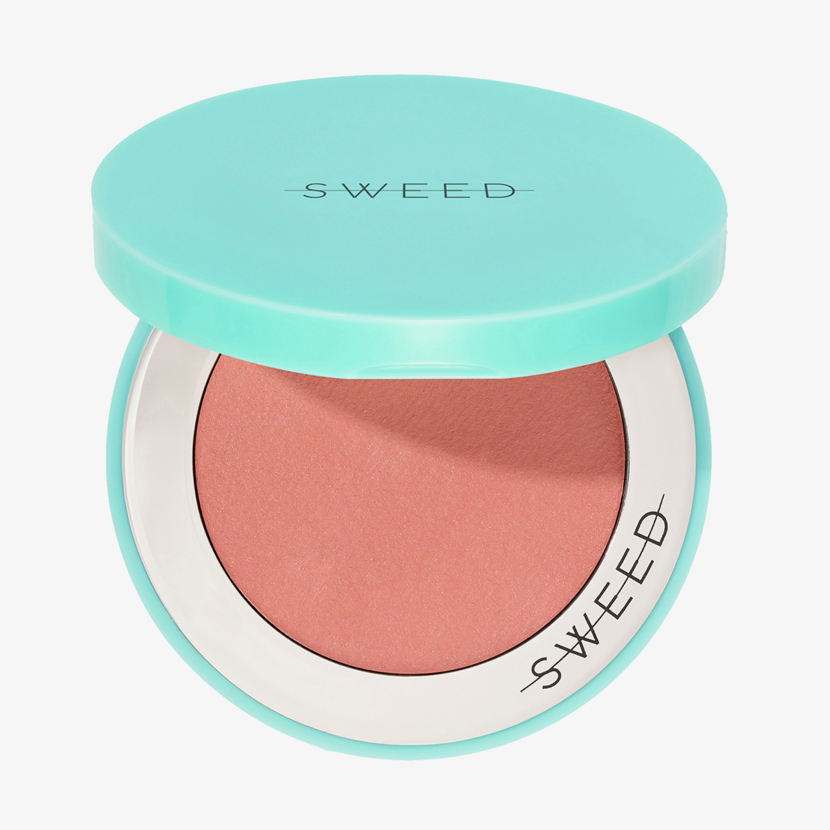 Eine türkisfarbene „Air Blush Cream“-Dose von SWEED mit pfirsichfarbenem Rouge im Inneren, auf deren Deckel und Rand die Aufschrift „SWEED“ zu sehen ist.