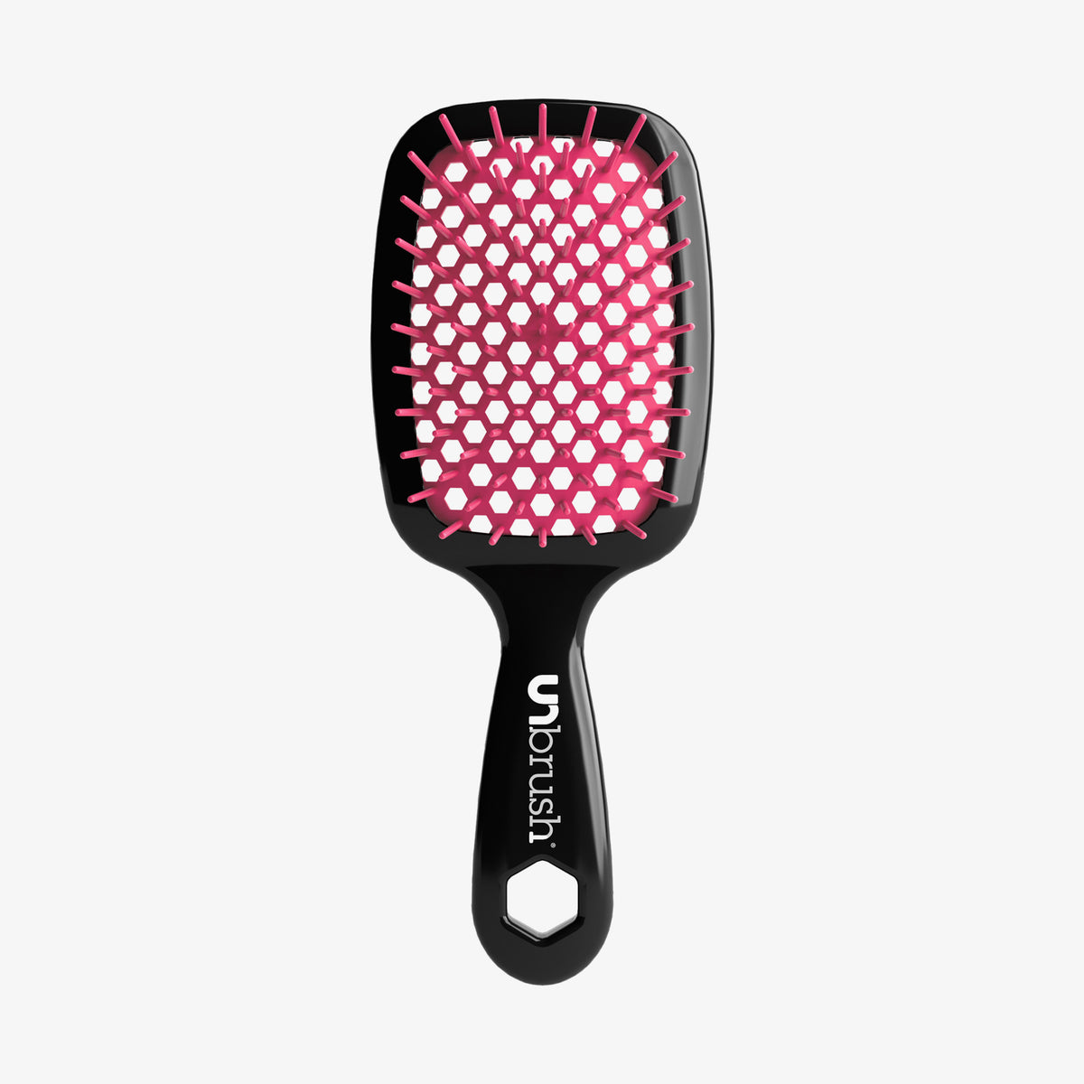 Die UNbrush Detangling Hair Brush hat ein schwarzes Paddle-Design mit rosa Borsten und einem sechseckigen Loch im Griff.