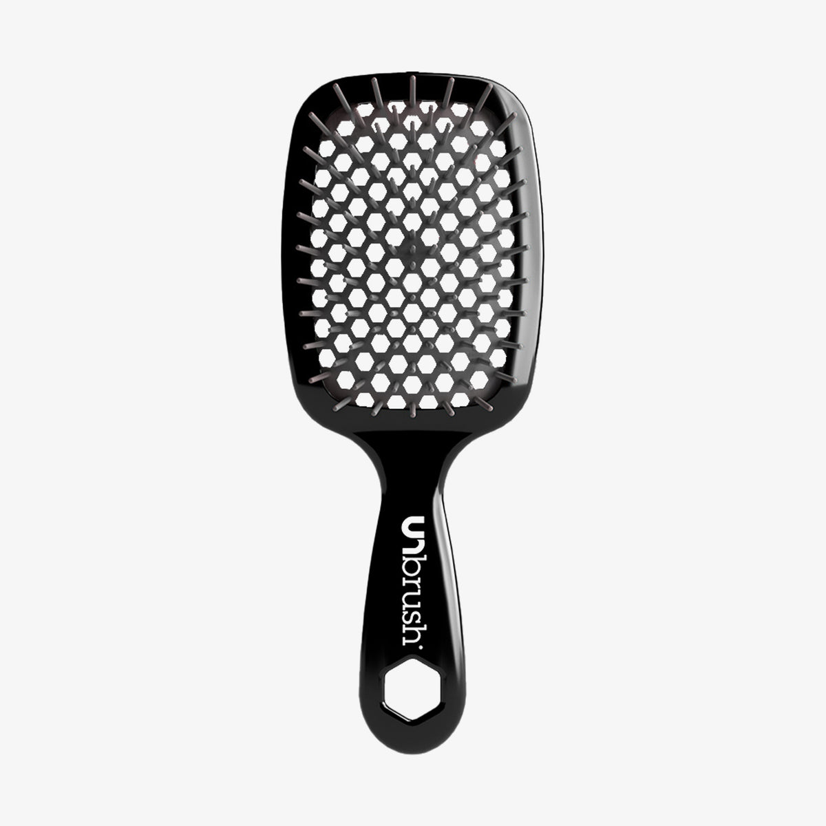Die schwarze UNbrush Detangling Hair Brush hat einen wabenförmigen Bürstenkopf mit dem Schriftzug "UNbrush" auf dem Griff.