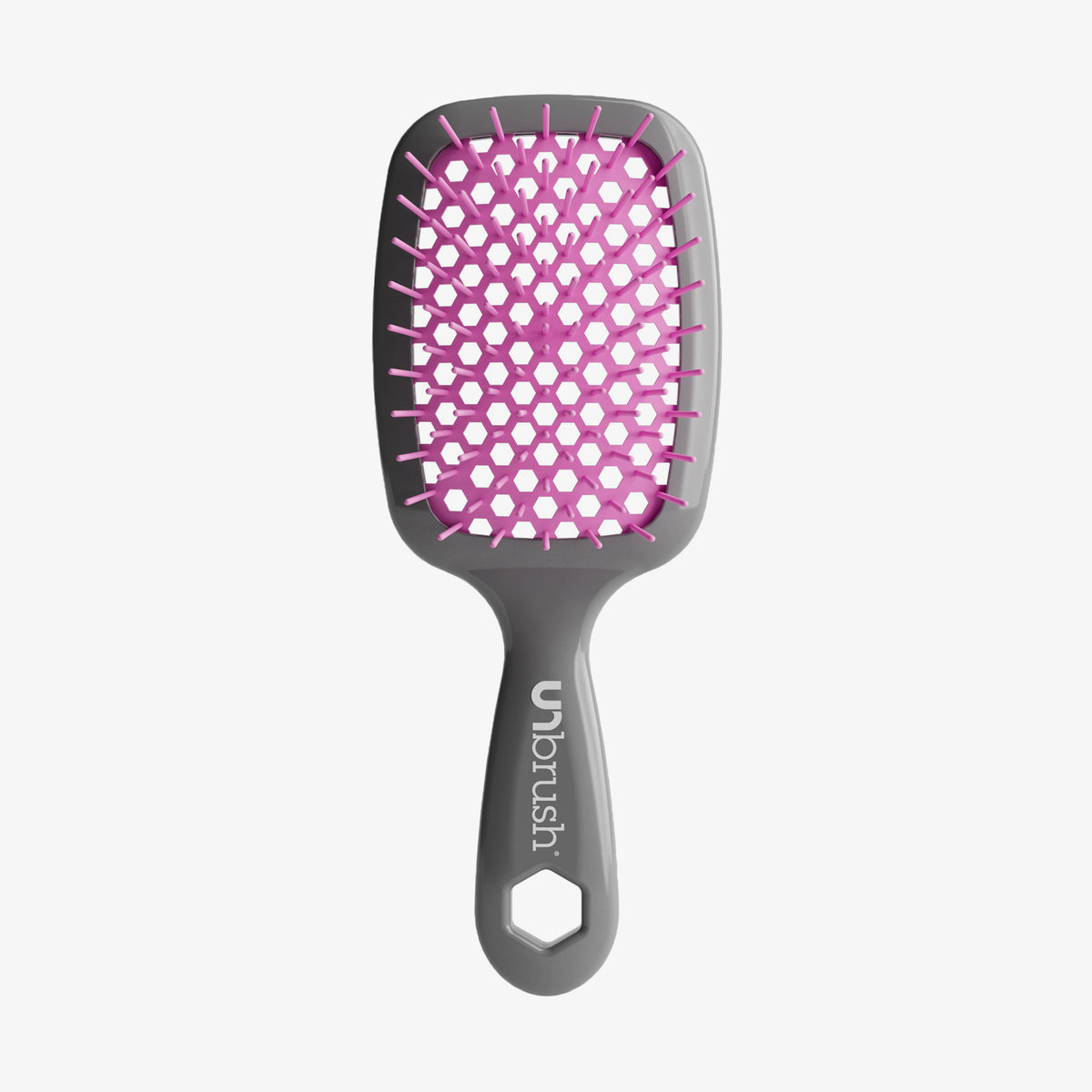 Die UNbrush Detangling Hair Brush hat einen grauen Griff mit dem UNbrush"-Schriftzug, ein pinkfarbenes Kissen und breite Borsten zum leichten Entwirren.