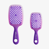 Zwei lila Ombré-Haarbürsten mit Belüftung aus der UNbrush Ombre Duo Set-Kollektion in verschiedenen Größen.