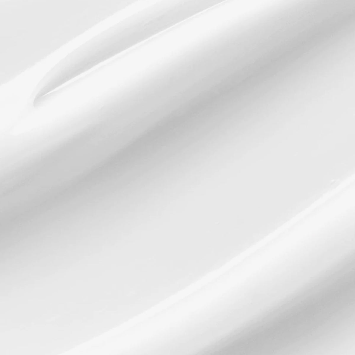 Nahaufnahme der glatten, cremeweißen Textur der Heartleaf 70 Daily Lotion mit sanften Rillen und glänzendem Finish.