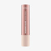 Ein roségoldener Catrice Cosmetics Diamond Glaze Gloss Stick steht aufrecht auf einem weißen Hintergrund.