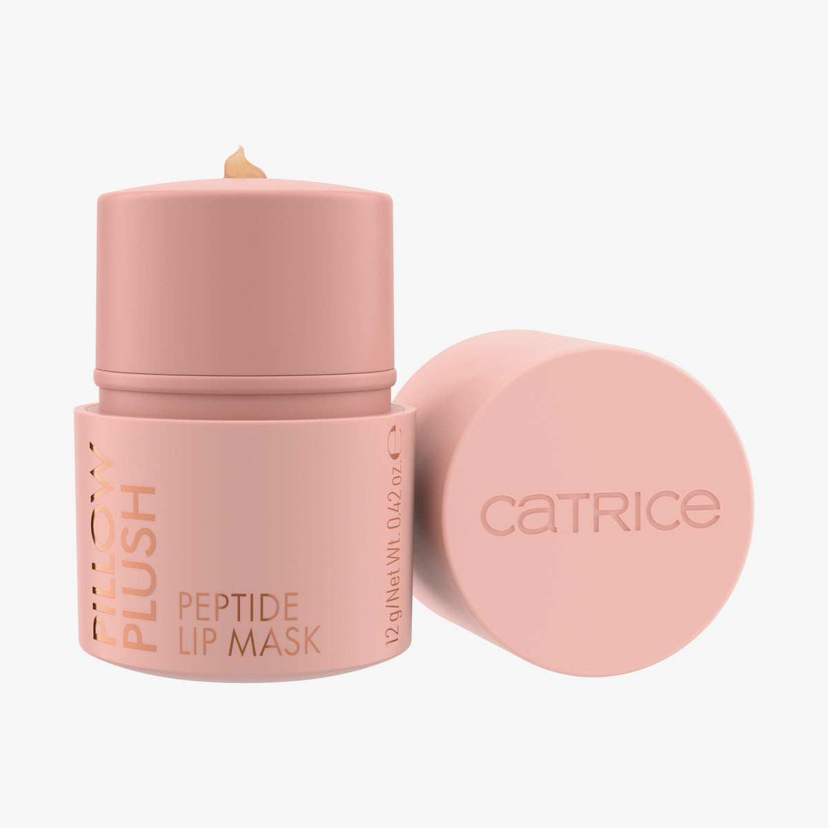 Rosa Tiegel der Catrice Pillow Plush Peptide Lip Mask mit geöffnetem Deckel und sichtbarer Produktspitze vor weißem Hintergrund.