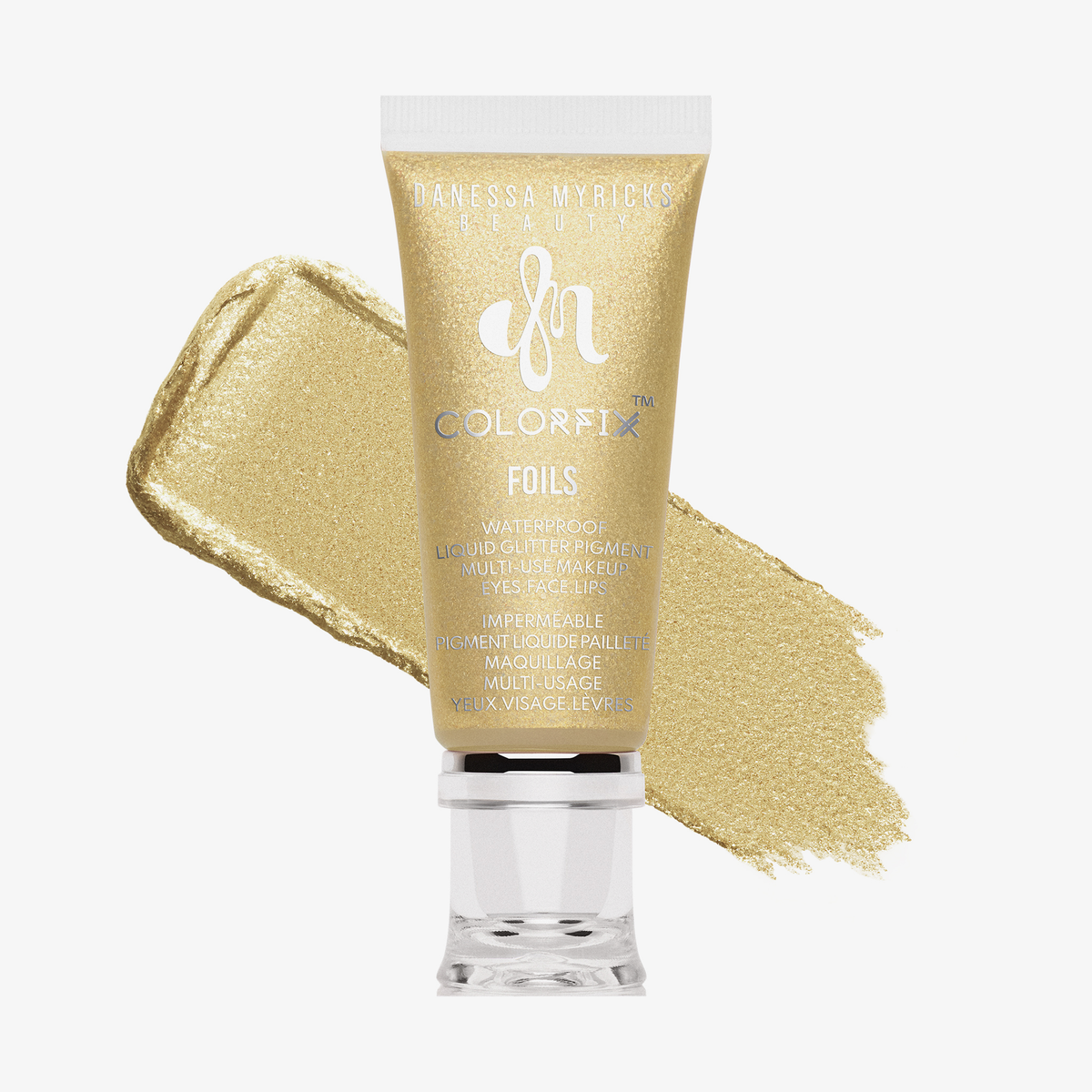 Tube Danessa Myricks Beauty Colorfix Foils in Twinkle, mit einem goldenen Muster auf weißem Hintergrund.