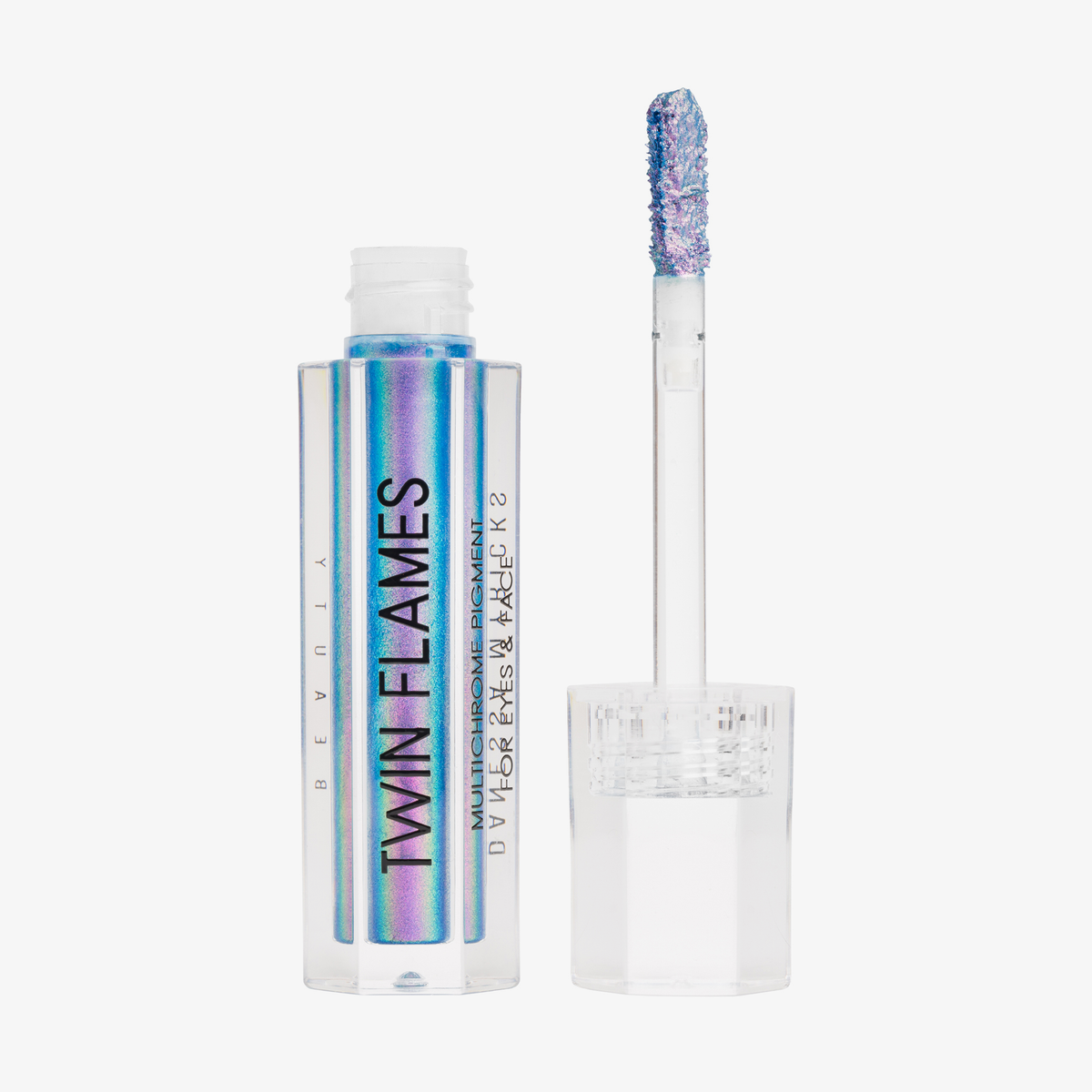Eine offene durchsichtige Tube Twin Flames Euphoria mit lila-blau schimmerndem Inhalt vor weißem Hintergrund.