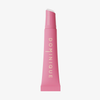 Juicy Lip Balm von Dominique Cosmetics in einer rosafarbenen Tube mit weißem Text, aufrecht auf weißem Hintergrund.