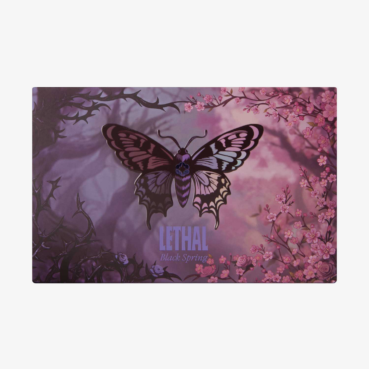 Geschlossene Lethal Cosmetics Black Spring Pressed Powder Palette mit Schmetterlingsdesign, floralen Akzenten und dem Text "LETHAL Black Spring".
