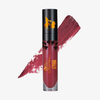 Eine Tube des flüssigen Samt-Lippenstifts „Over The Garden Wall – Poetry & Clarinet“ von Lethal Cosmetics mit Motiven aus schwarzen Palmen und gelben Greifen.