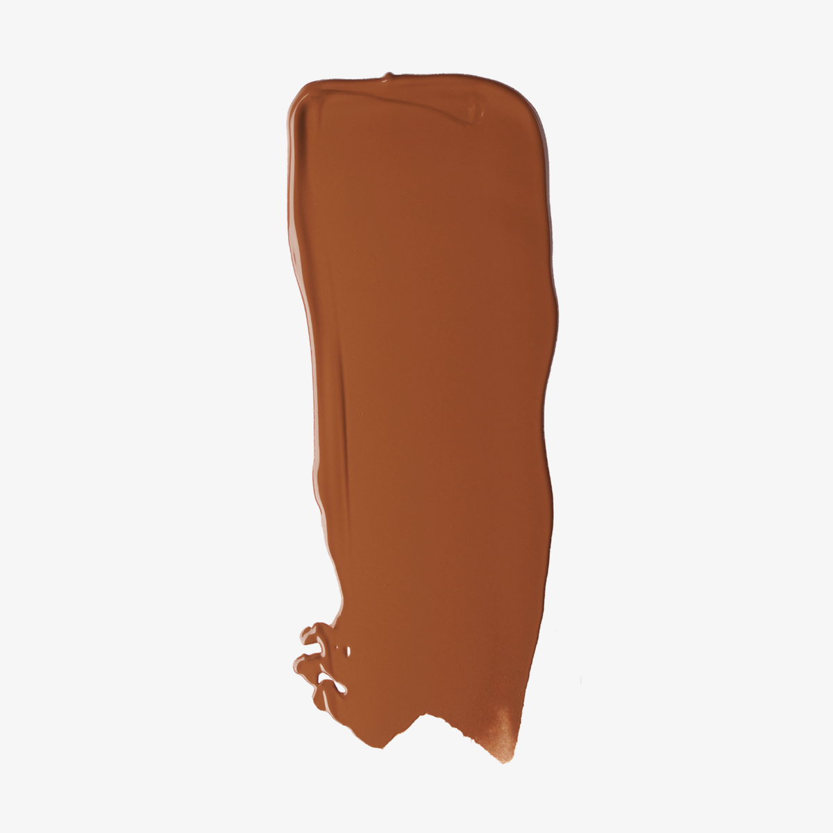 Ein einziger Strich der „Ctrl+ SKIN“-Foundation von LH Cosmetics in der Farbe „Medium Brown“ auf weißem Hintergrund.