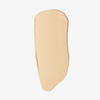Ein glatter, beiger Farbtest der „Ctrl+ SKIN“-Grundierung von LH Cosmetics auf weißem Hintergrund.