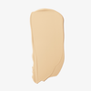Ein Farbmuster der „Ctrl+ SKIN“-Foundation von LH Cosmetics in der Farbe „Light Beige“ lässt sich gleichmäßig auf einem weißen Hintergrund auftragen.