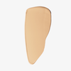 Ein gleichmäßiger, beiger Farbtupfer der „Ctrl+ SKIN“-Foundation von LH Cosmetics ist auf einem weißen Hintergrund aufgetragen.