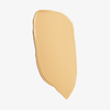 Ein gleichmäßiger, beiger Farbauftrag der „Ctrl+ SKIN“-Foundation von LH Cosmetics auf weißem Hintergrund.