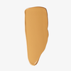 Ein Farbmuster der „Ctrl+ SKIN“-Foundation von LH Cosmetics in der Farbe „Warm Beige“ auf weißem Hintergrund.