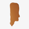 Ein Strich der „Ctrl+ SKIN“-Grundierung in Mittelbraun von LH Cosmetics auf weißem Hintergrund.