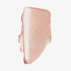 Farbmuster des „Art Of Skin Glazing Stick“ von NABLA Cosmetics in schimmerndem Roségold, aufgetragen auf einem weißen Hintergrund.