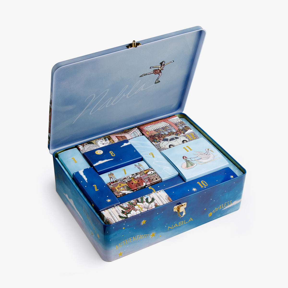 Der NABLA Adventskalender 2025 von NABLA Cosmetics ist eine blaue Blechdose mit nummerierten Fächern und skurrilen Illustrationen, die an einen Adventskalender erinnern.