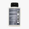 Rückseite von OLAPLEX N°5 CURL Bond Shaper Hydrating Curl Conditioner mit Gebrauchsanweisung, Text und QR-Code auf grauem Etikett.