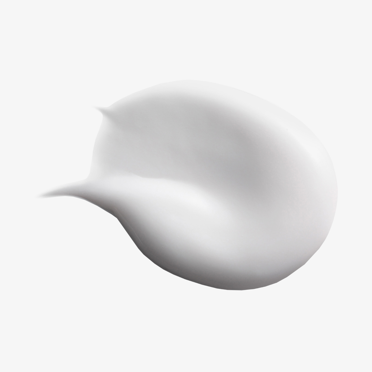 Ein weißer, cremiger Klecks des „Philip Kingsley Re-Moisturizing Conditioner“ auf einem schlichten weißen Hintergrund.