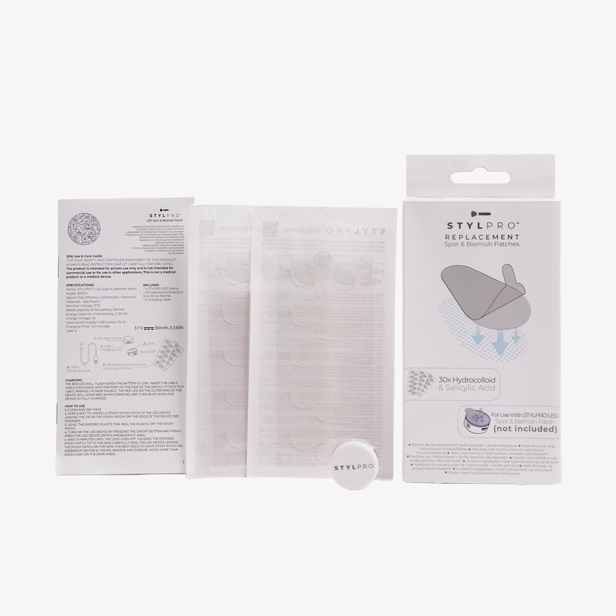Set mit STYLPRO Spot & Blemish Patch Ersatzpads, bestehend aus Anleitung, 30 Hydrocolloid-Patches mit Salicylsäure und Verpackung auf weißem Hintergrund.
