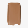 Ein rechteckiges Farbmuster der SWEED Glass Skin Foundation in der Farbe „Medium Brown“ auf weißem Hintergrund.