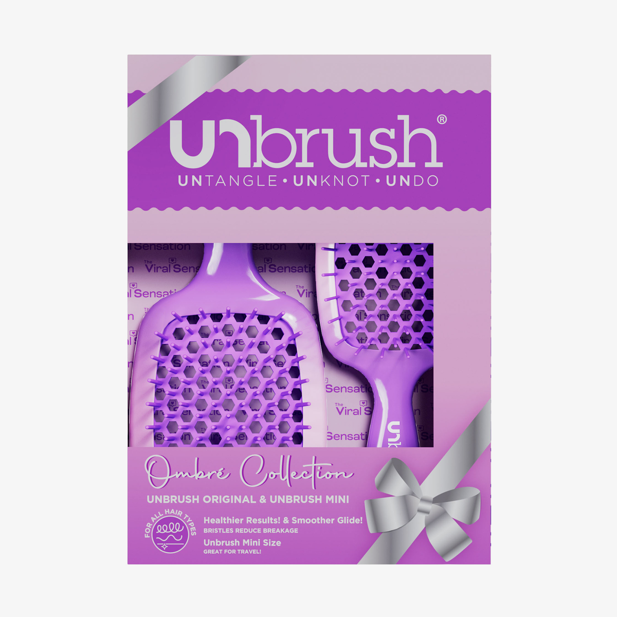 Zwei violette UNbrush Ombre Duo Set Collection-Entwirrbürsten in einer Geschenkbox mit silbernem Band.
