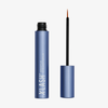 XLASH Xlash Sensitive Wimpernserum in einer blauen Tube, abgebildet mit Applikatorstift neben dem geöffneten Behälter.