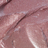 GLOWEYE EYESHADOW von BLONDESISTER: metallisches Rosa in Cremeform mit Schimmer, Glitzer und sichtbaren Pinselstrichen.