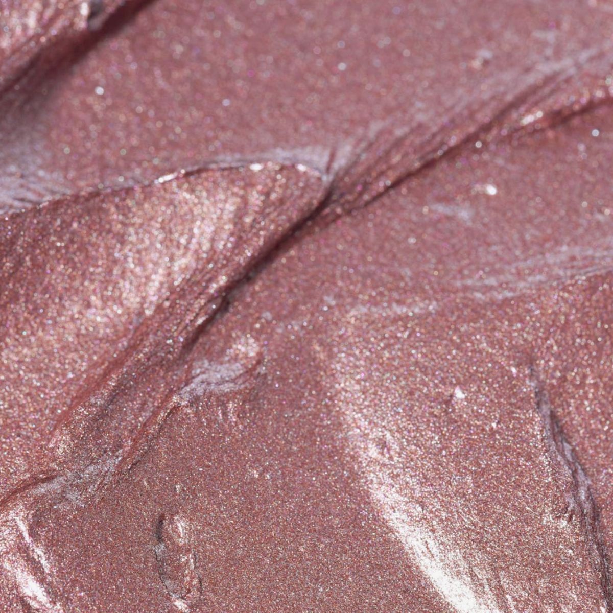 GLOWEYE EYESHADOW von BLONDESISTER: metallisches Rosa in Cremeform mit Schimmer, Glitzer und sichtbaren Pinselstrichen.