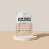 Eine Packung breakout+aid Skin Reset Niacinamide Mask auf einem weißen Sockel.
