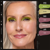 Lächelnde Frau mit Danessa Myricks Beauty Colorfix Mattes: grüner Lidschatten, natürliches Make-up, rosa Lippen. Die Namen der Farbtöne sind neben ihr angegeben.