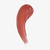 Ein rosabrauner Farbfleck des „Beauty Glosswork 4D Ultra Shine Plumping Gloss“ von Danessa Myricks auf weißem Hintergrund.