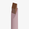 Der Dominique Cosmetics Lip Frame Pencil in der Farbe Dulce de Leche mit abgewinkelter, quadratischer Spitze steht auf weißem Hintergrund.