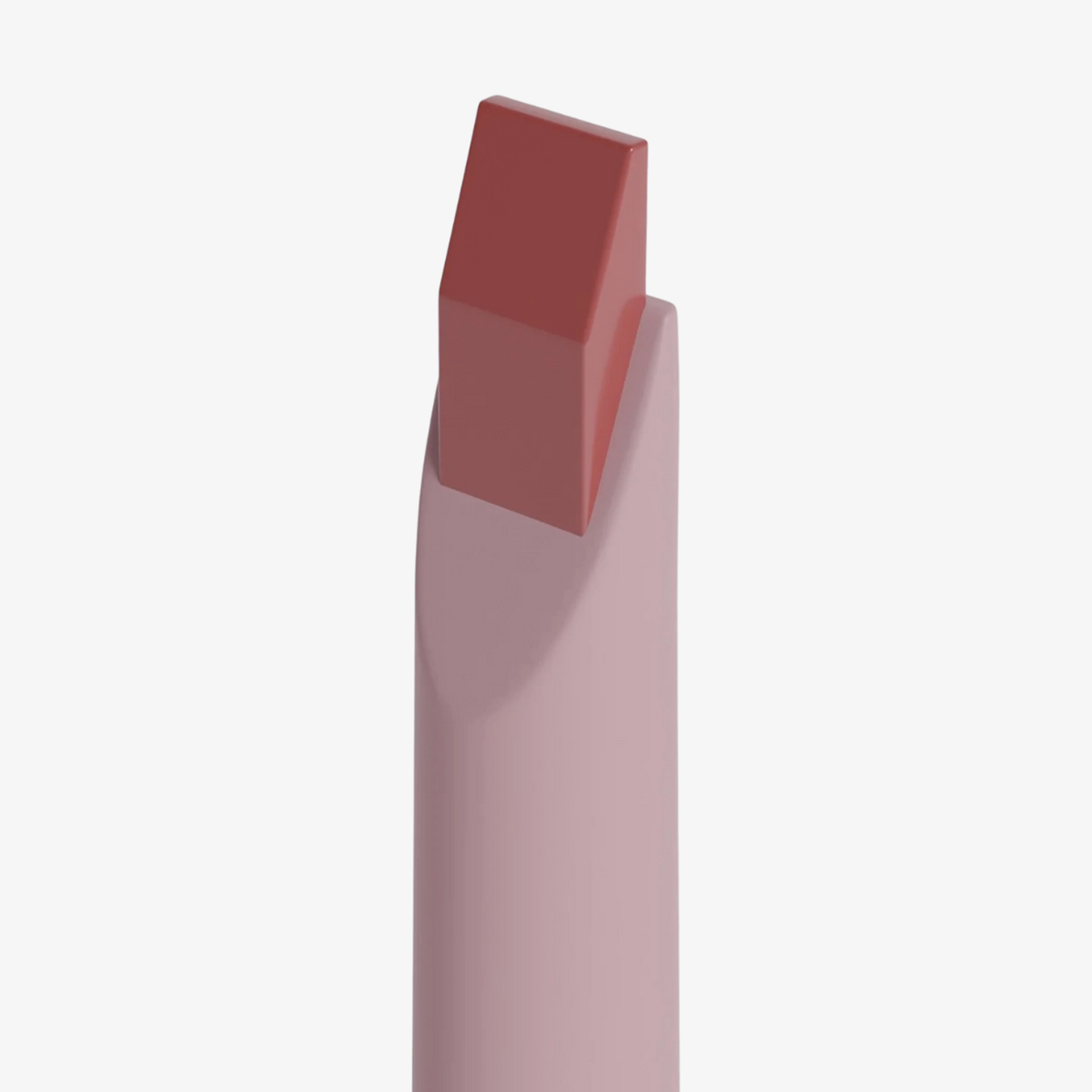 Der Dominique Cosmetics Lip Frame Pencil in der Farbe I'm Blushing mit abgewinkelter, quadratischer Spitze steht auf weißem Hintergrund.