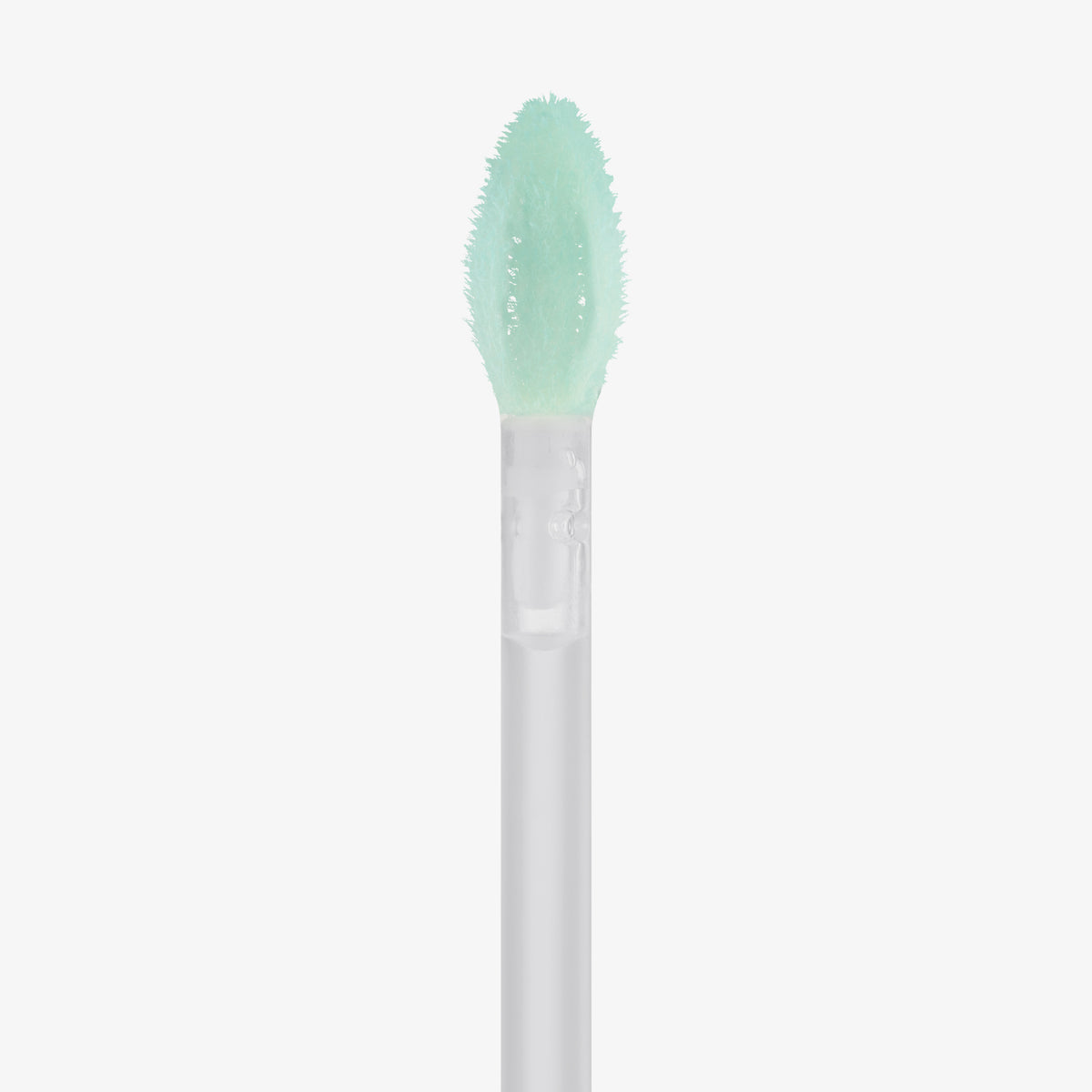 Eine Nahaufnahme des Applikators von Essence jelly GRIP EYESHADOW PRIMER mit einer mintgrünen, strukturierten, blattförmigen Spitze auf weißem Hintergrund.