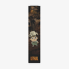 Cartoon-Junge mit einem Wasserkocher auf dem Kopf in einem dunklen Wald. Text: „Over The Garden Wall“ – „Rock Fact Velvet Liquid Lipstick“ von Lethal Cosmetics.