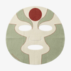 „Die Legende von Korra“ – „Equalist Sheet Face Mask“ von Lethal Cosmetics: flache Gesichtsmaske mit Ausschnitten für Augen und Mund, hellgrün-rotes abstraktes Muster.
