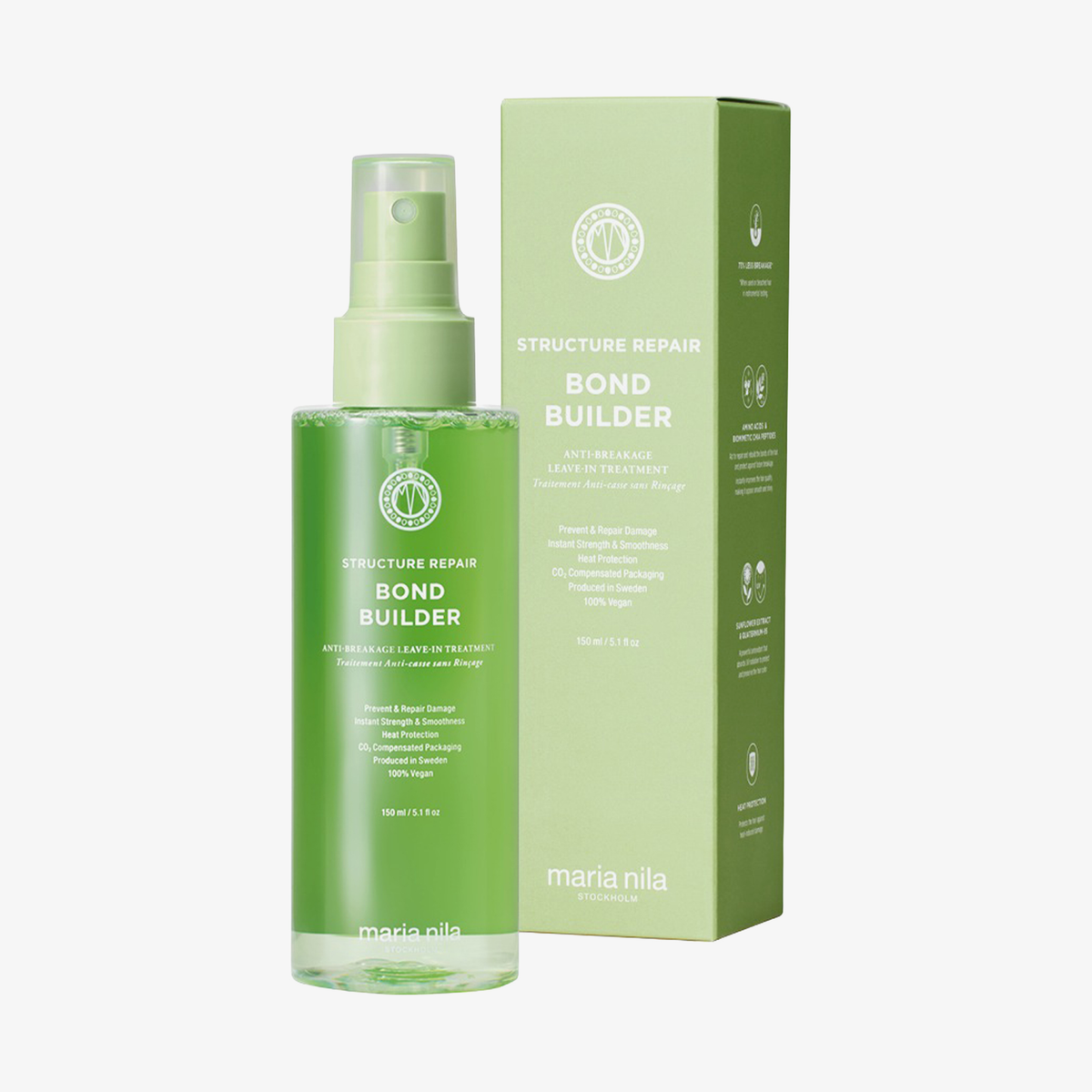 Eine grüne Sprühflasche von maria nila Structure Repair Bond Builder neben der dazugehörigen grünen Schachtel.