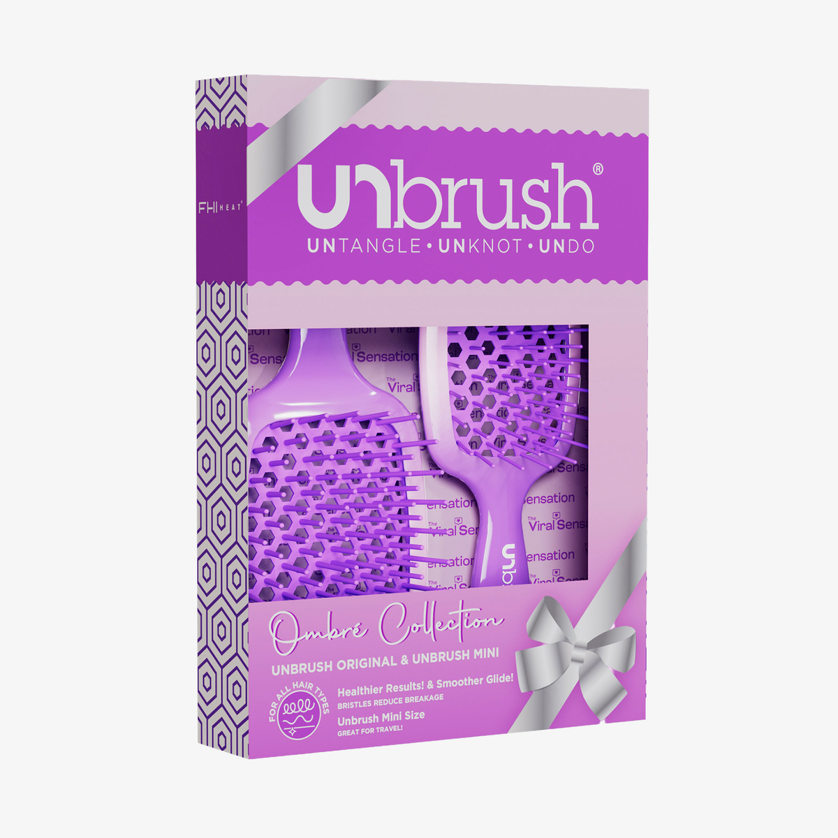 Zwei lila Haarbürsten aus der UNbrush Ombre Duo Set-Kollektion in einer Geschenkbox.