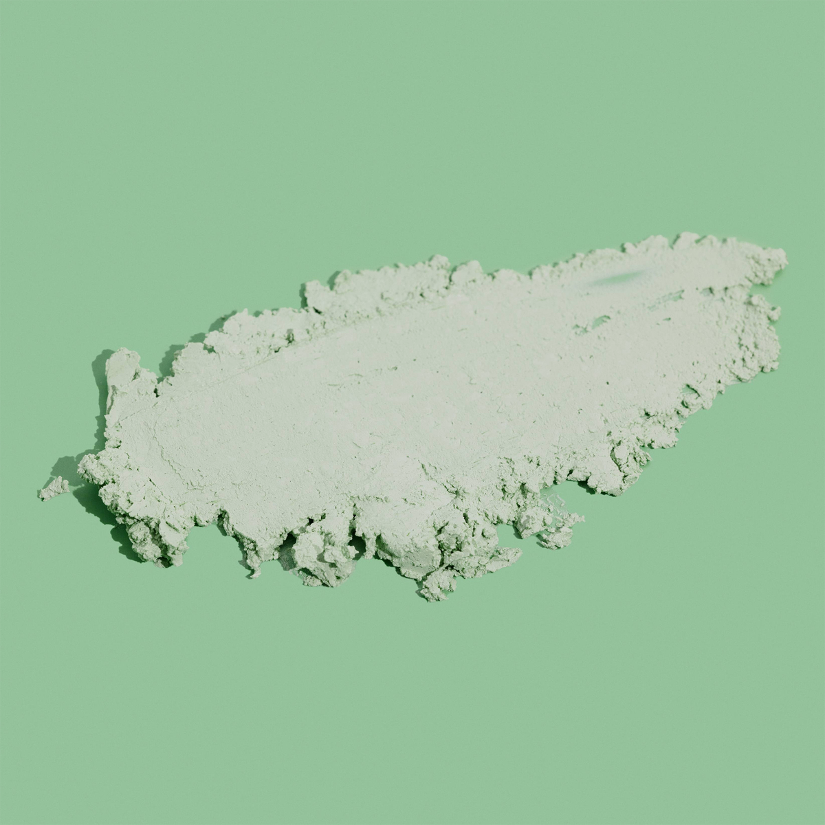 Ein Klecks hellgrüner Blemish & Spot Stick-Paste.