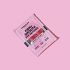 Eine rosa, rechteckige Packung breakout+aid Firm + Smooth – Hydrogel-Augenpads mit einem Aufdruck, der die Vorteile wie Straffung, Lifting und Milderung von Falten beschreibt.