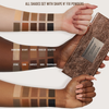 Drei Arme mit unterschiedlichen Hauttönen zeigen Swatches von zehn neutralen Farbtönen aus der Danessa Myricks Beauty Groundwork Palette - Defining Neutrals neben der Bronze-Palette.