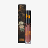 Eine Tube „Over The Garden Wall – Rock Fact Velvet Liquid Lipstick“ von Lethal Cosmetics mit einer Verpackung im Wald-Cartoon-Design.