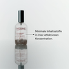 Eine Flasche MERME Antioxidant Mist With Rose Quartz steht neben einem deutschen Text über minimale, effektive Inhaltsstoffe.