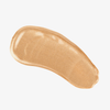 Ein Hauch von schimmerndem, goldfarbenem Creme-Make-up aus dem STELLAR GLOW CHRISTMAS KIT.
